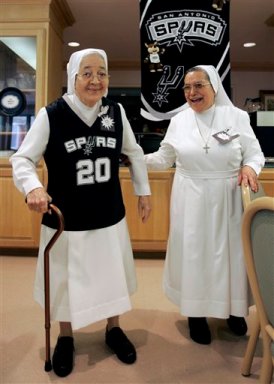 Rosalba Garcia, wearing a San Antonio Spurs jersey, Angelina Gomez