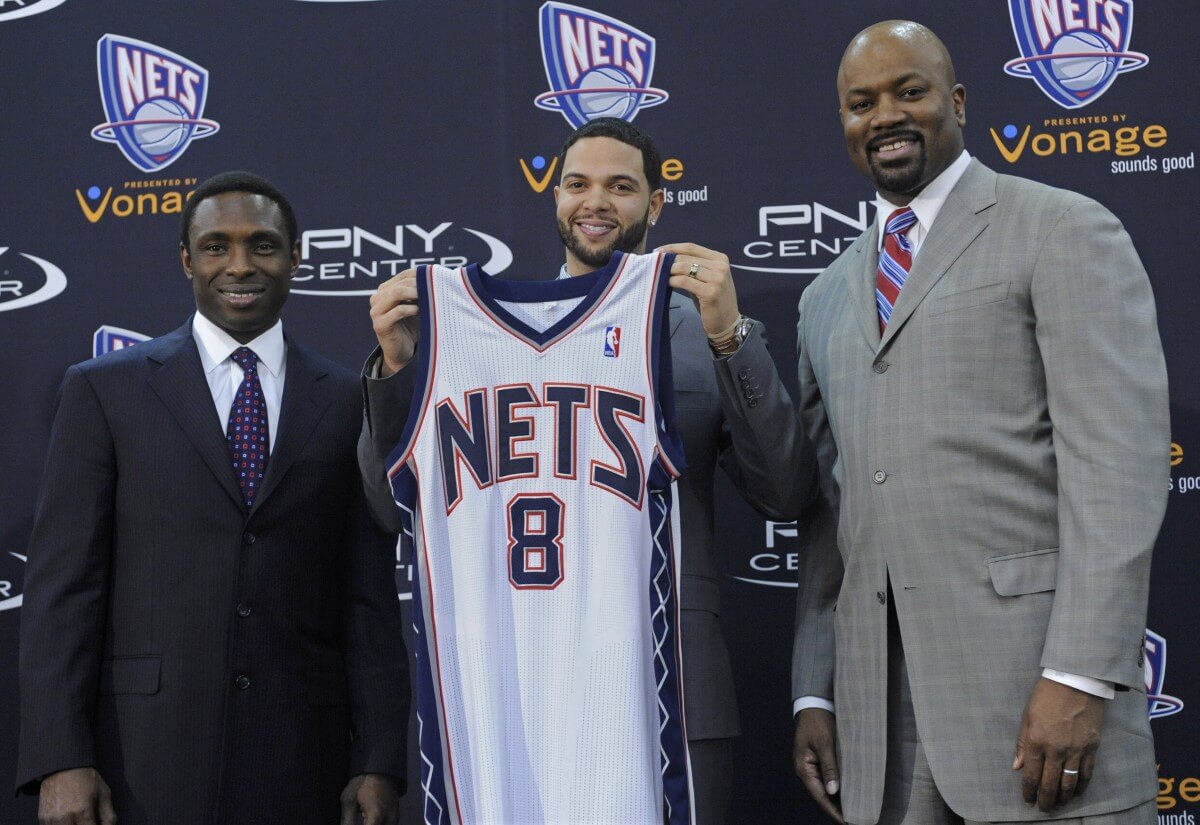 Avery Johnson, Deron Williams, and Billy King in 2011. (AP)