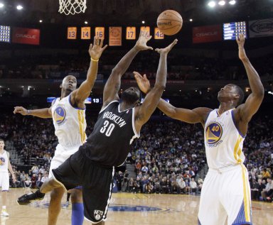 Reggie Evans, Carl Landry, Harrison Barnes