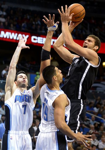 Brook Lopez, J.J. Redick, Gustavo Ayon