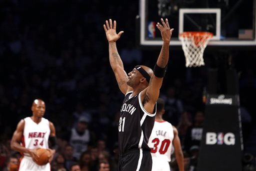 Jason Terry leads the crowd as good basketball leads the Nets to an upset victory. (AP)