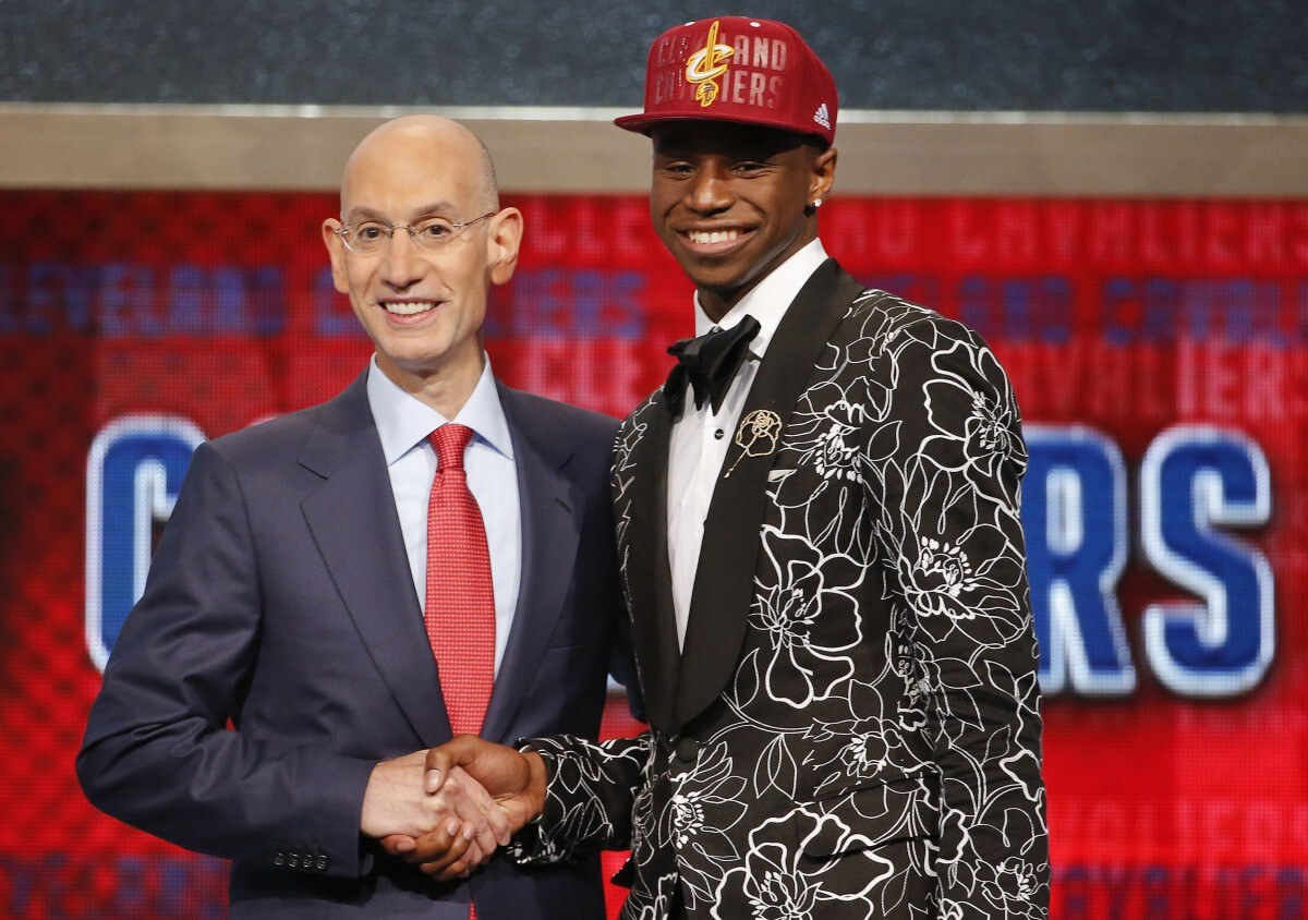 Andrew Wiggins (right) was taken first in the draft last year. (AP)