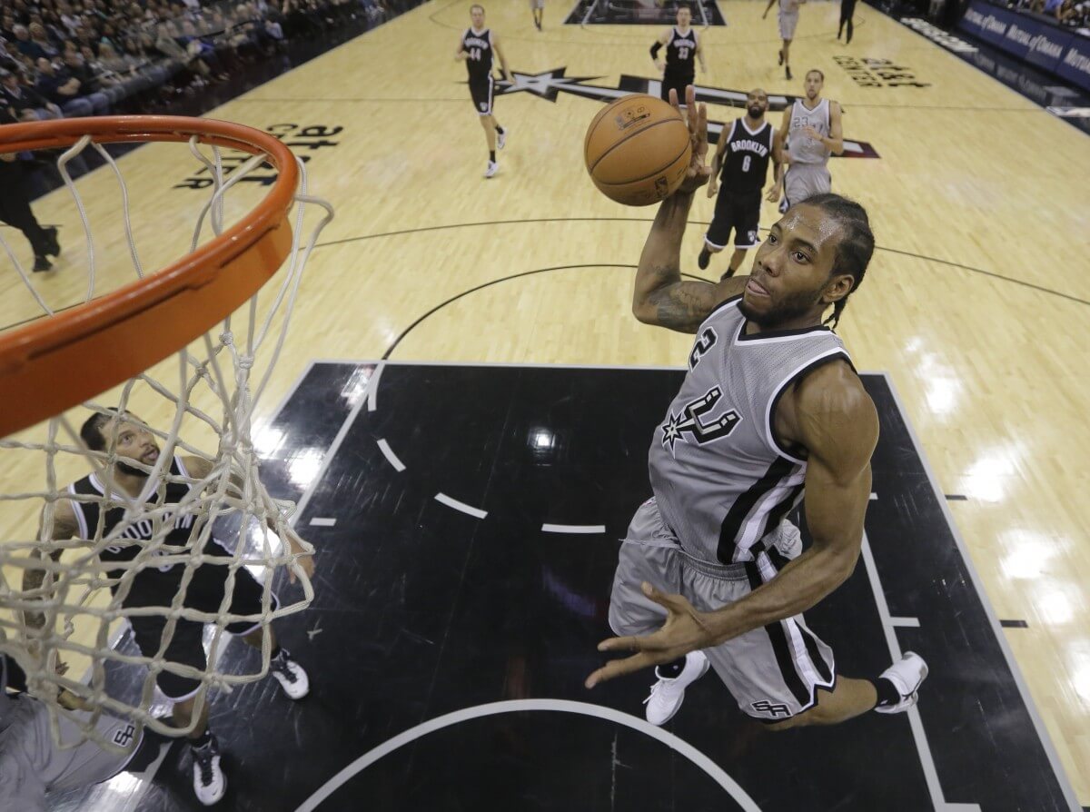 Reigning NBA Finals MVP Kawhi Leonard & the Spurs shut down Brooklyn. (AP)