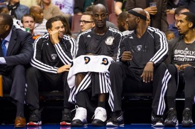 Deron Williams, Kevin Garnett, Reggie Evans