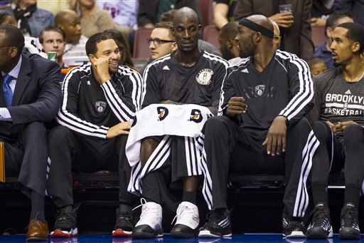 Deron Williams, Kevin Garnett, Reggie Evans