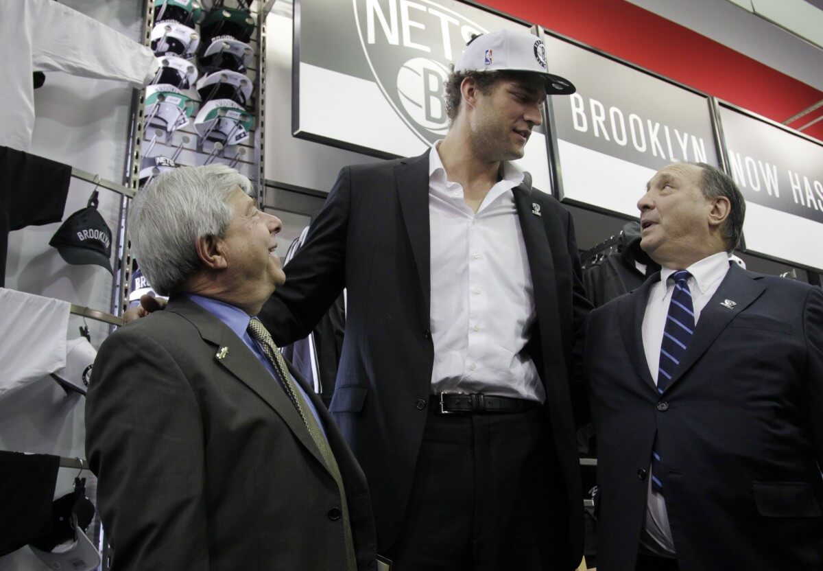 Brook Lopez with Nets minority owner Bruce Ratner (right) in 2012. (AP)