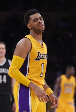 Los Angeles Lakers guard D'Angelo Russell makes a face after making a three point shot during the second half of an NBA basketball game against the Brooklyn Nets, Tuesday, March 1, 2016, in Los Angeles. The Lakers won 107-101. (AP Photo/Mark J. Terrill)