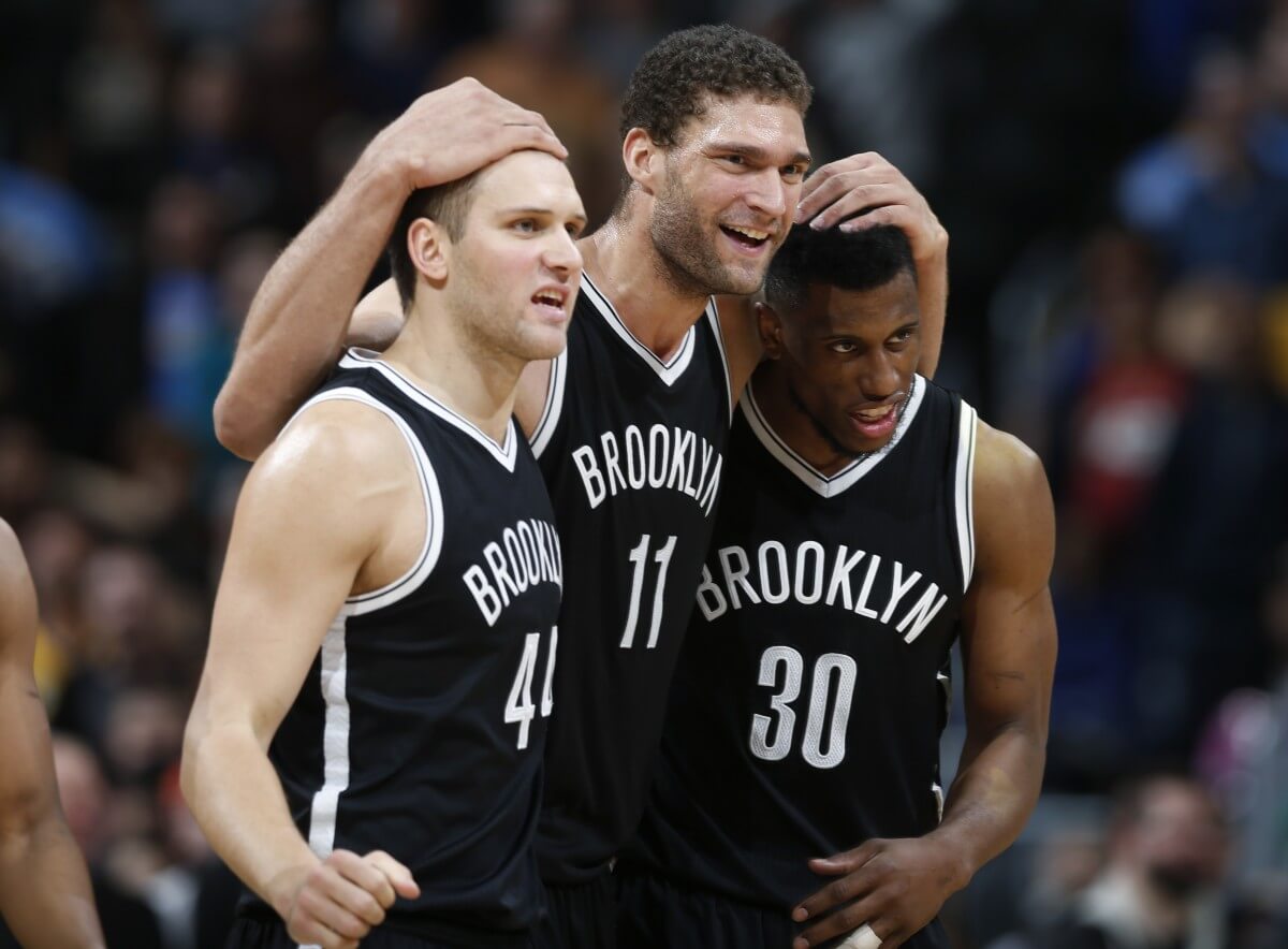 Lopez (center) and Young (right) will each miss their first game of the season tonight. (AP)