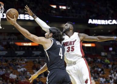 (AP Photo/Luis Scola)