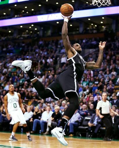 Thomas Robinson shoots on a drive to the basket during the second half in Boston. (AP Photo/Charles Krupa)