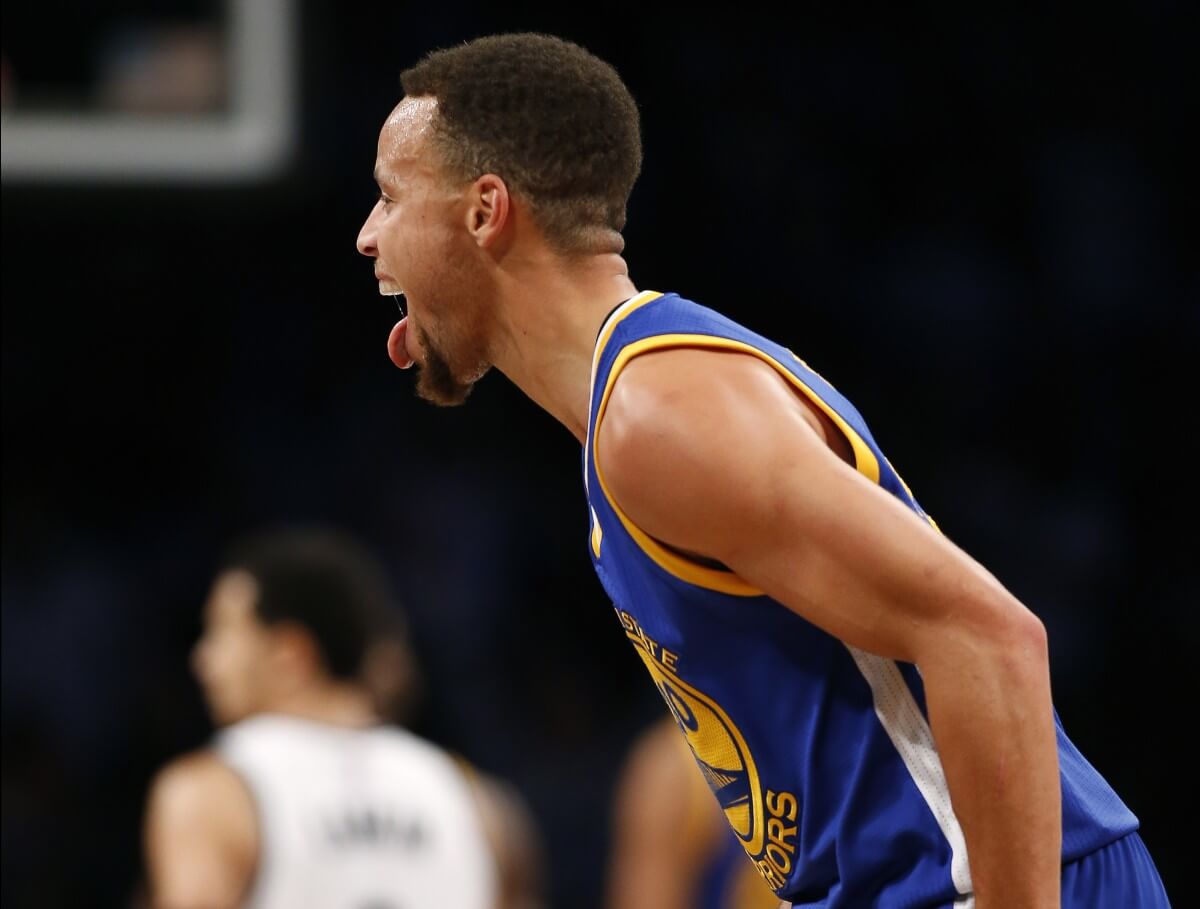 Curry after hitting his 116th three-pointer of the season Sunday night. (AP)