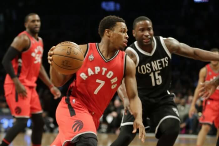 Toronto Raptors' Kyle Lowry (7) drives past Brooklyn Nets' Donald Sloan (15) during the first half of an NBA basketball game Wednesday, Jan. 6, 2016, in New York. (AP Photo/Frank Franklin II)
