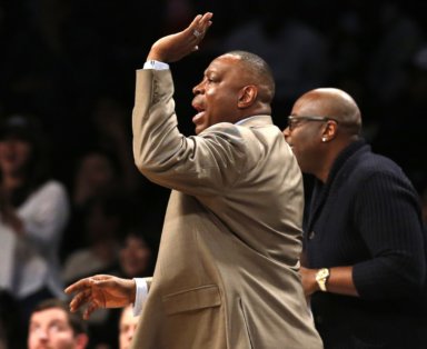 Brooklyn Nets interim head coach Tony Brown gestures in the second half of an NBA basketball game against the San Antonio Spurs, Monday, Jan. 11, 2016, in New York. In Brown's first game as interim head coach, the Spurs defeated the Nets 106-79. (AP Photo/Kathy Willens)