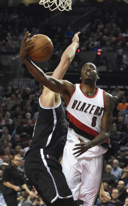 Portland Trail Blazers forward Al-Farouq Aminu (8) drives to the basket during the fourth quarter of an NBA basketball game against the Brooklyn Nets in Portland, Ore., Tuesday, Feb. 23, 2016. The Blazers won 112-104. (AP Photo/Steve Dykes)