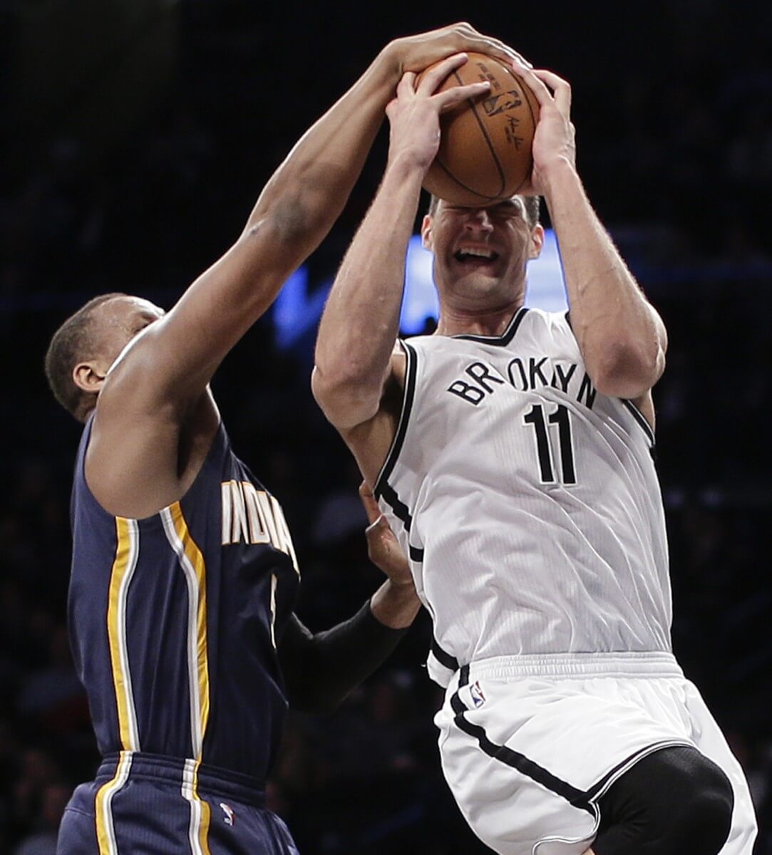 Indiana Pacers forward Lavoy Allen (5) blocks a shot attempt by Brooklyn Nets center Brook Lopez (11) during the second quarter of an NBA basketball game Wednesday, Feb. 3, 2016, in New York. (AP Photo/Julie Jacobson)