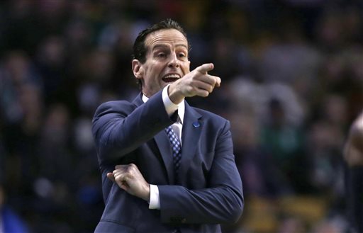 RETRANSMITTING TO CORRECT TO KENNY ATKINSON NOT MIKE BUDENHOLZER IN FIRST REFERENCE FILE - This Nov. 13, 2015 file photo shows Kenny Atkinson calling to players during the first quarter of an NBA basketball game in Boston. The Brooklyn Nets have hired the Hawks assistant Kenny Atkinson as their new coach, Sunday, April 17, 2016. (AP Photo/Charles Krupa, file)