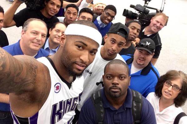 DeMarcus Cousins is all smiles (and selfies) with the media now. But can they win? 