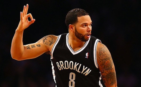 Deron-Williams-takes-a-look-at-the-monitor-thinks-his-new-tat-looks-A-OK.-Getty-Images-inset-via-Comedy-Central