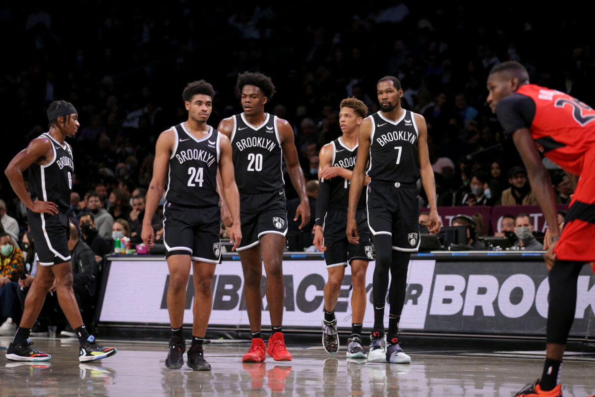 Brooklyn Nets forward Kevin Durant (7) returns to the floor after a time out with guard David Duke Jr. (6) and guard Cam Thomas (24) and center Day'Ron Sharpe (20) and forward Kessler Edwards (14) during the second quarter against the Toronto Raptors at Barclays Center. Mandatory Credit: Brad Penner-USA TODAY Sports