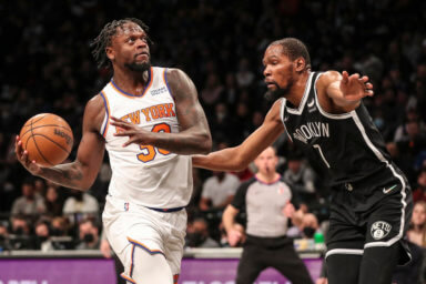 Brooklyn Nets forward Kevin Durant guards Knicks forward Julius Randle in their March 13 matchup.