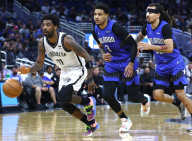 Nets guard Kyrie Irving controls the ball during his 60-points performance on Tuesday night.
