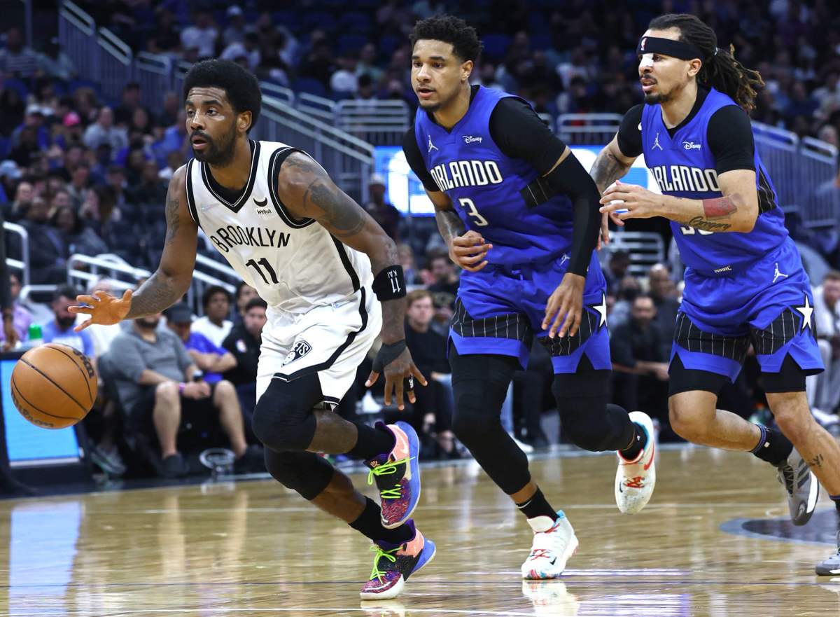 Nets guard Kyrie Irving controls the ball during his 60-points performance on Tuesday night.